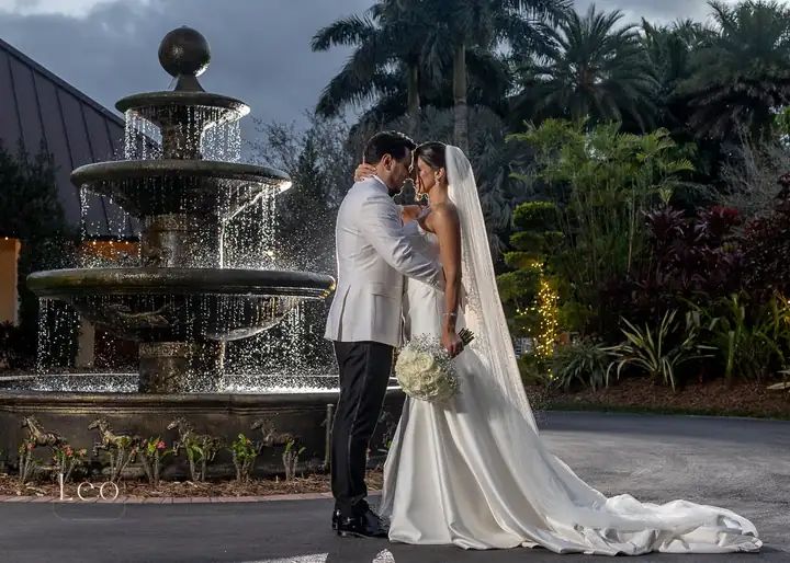 Couple portrait by the waterfall fountain
