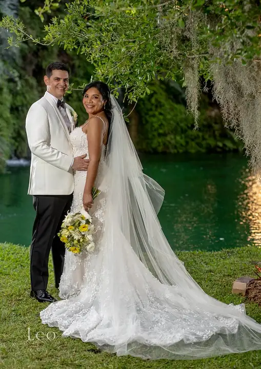 Bride and groom portrait in the greenery