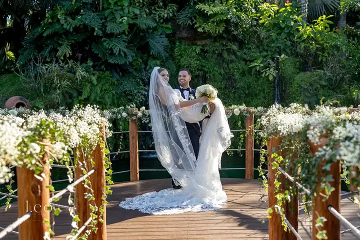 Bride posing on the Longan’s Place garden bridge