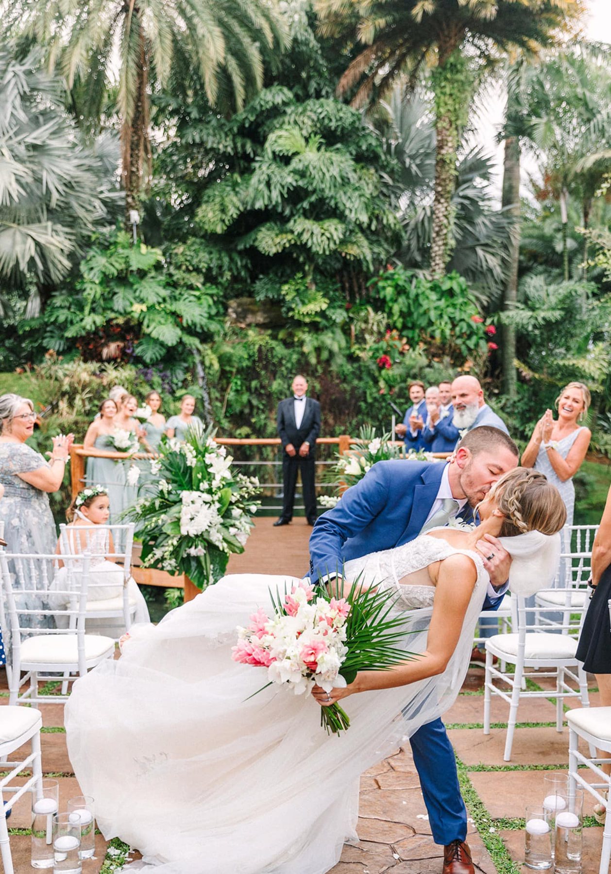 Guests watching an outdoor ceremony