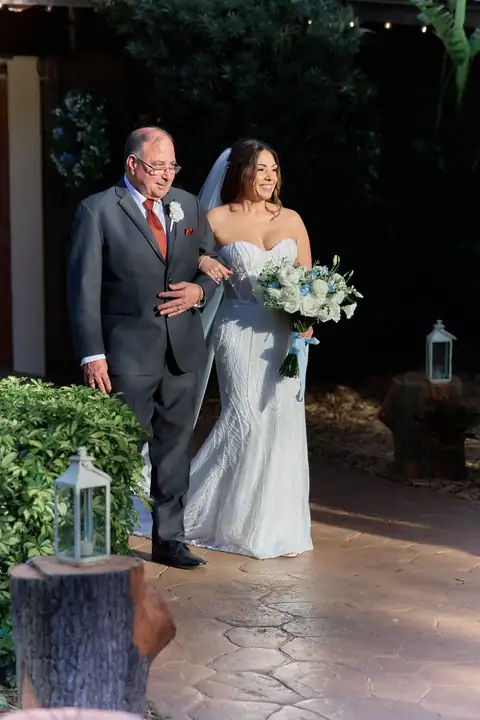 Bride entering the ceremony with escort
